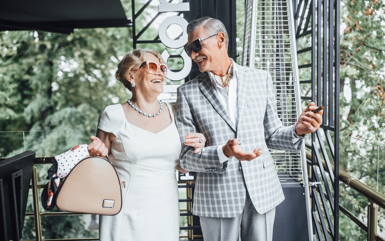 Attractive mature couple smiling face forward together