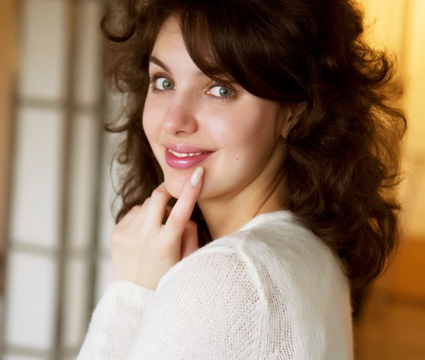 Senior woman smiling directly at the camera